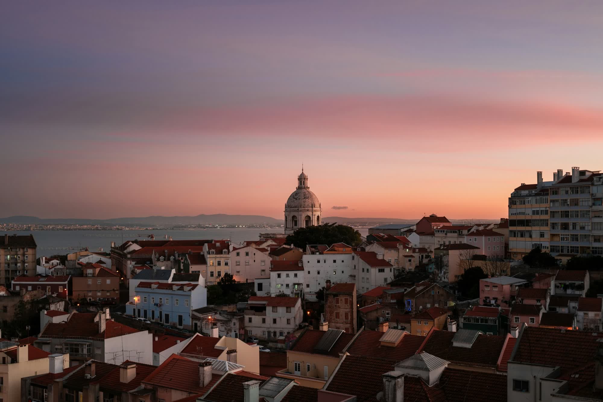 Alfama rooftops in Lisbon at sunset
